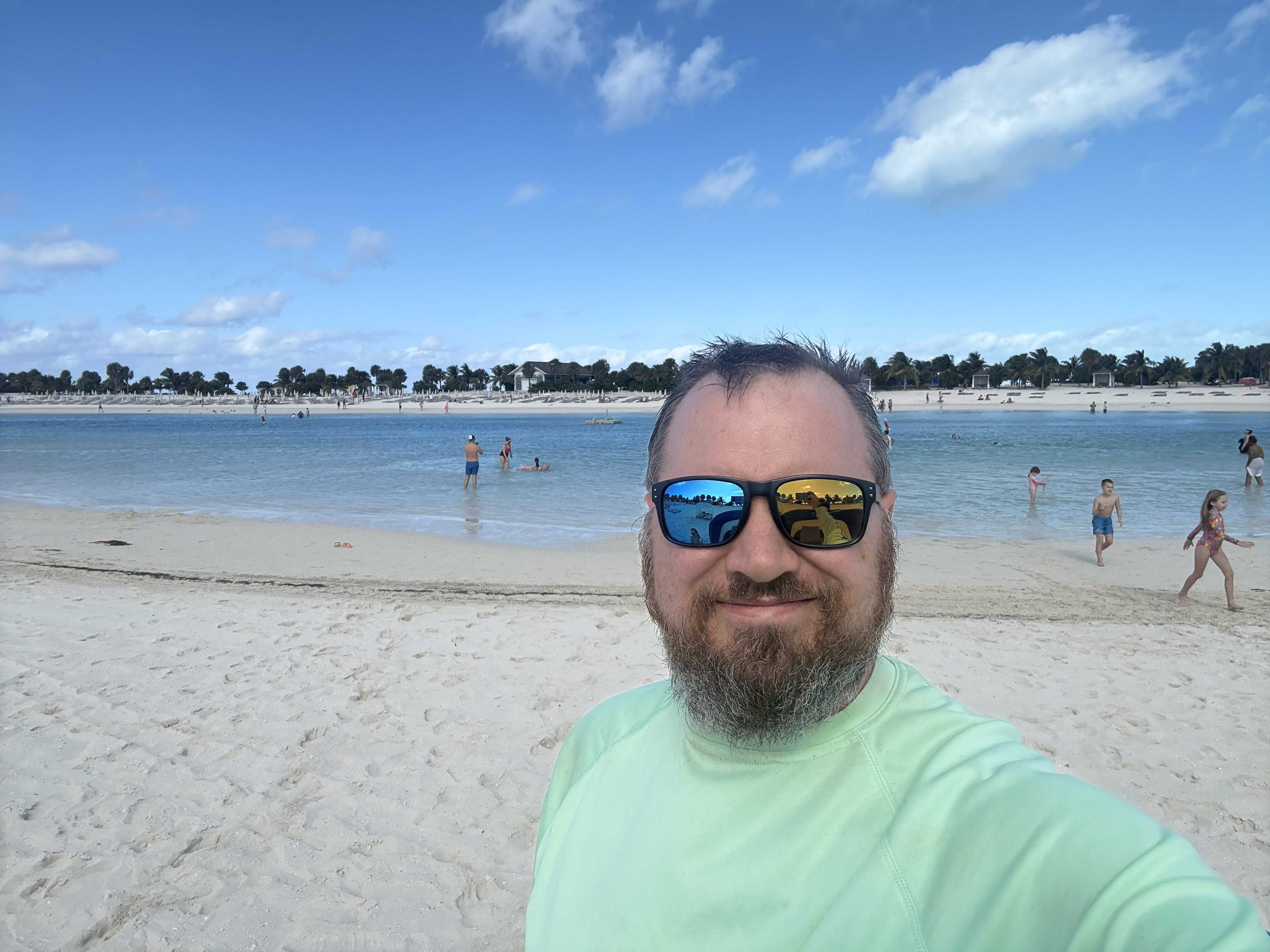 Nick resting on the beach at Ocean Cay